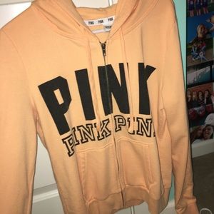 Orange zip up from pink